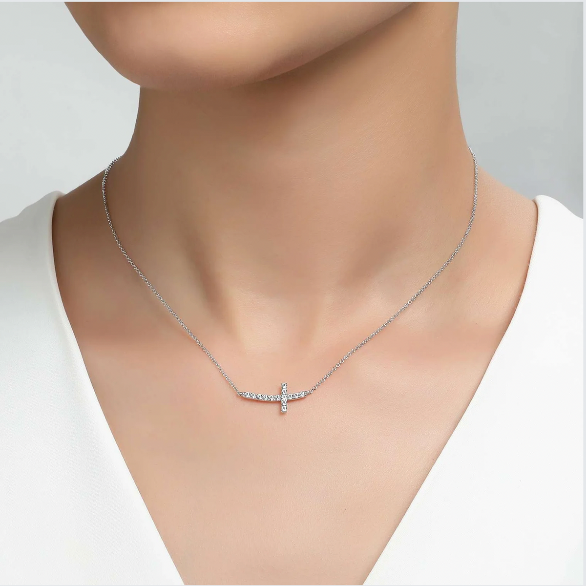 Sideways Curved Cross Necklace