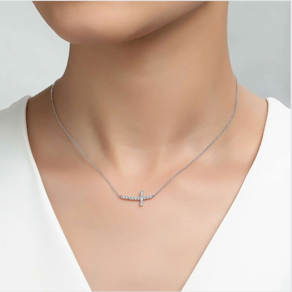 
                
                    Load image into Gallery viewer, Sideways Curved Cross Necklace
                
            